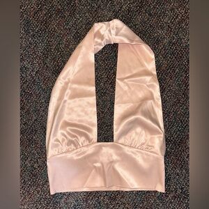 Silk and sexy going out top from boutique in Laguna beach. Only worn once.